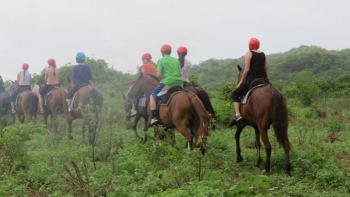 Horseback riding, Guanacaste, Costa Rica photo
